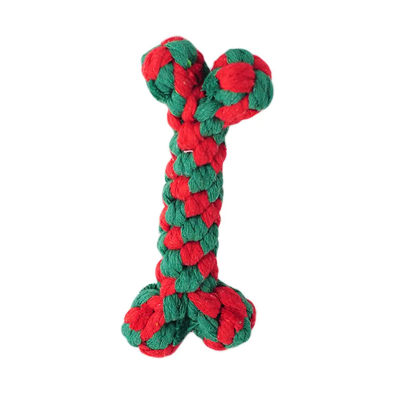 Red and green braided dog toy on a white background