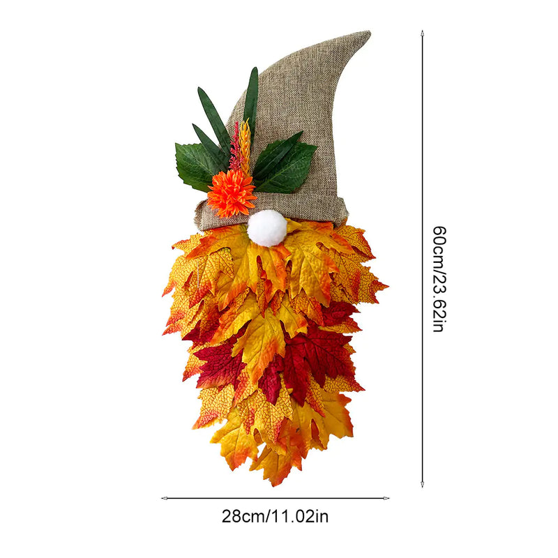 Decorative autumn-themed gnome with leaves and flowers, shown with dimensions on a white background.
