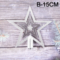 Decoración de estrella en la parte superior del árbol de Navidad