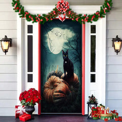 Decorative door with a black cat and pumpkin design, surrounded by Christmas decorations.