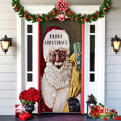 Decorative door with a black Santa Claus design and 'Merry Christmas' text, surrounded by holiday decorations.