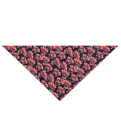 Dog bandana with pink floral and skull pattern on a black background