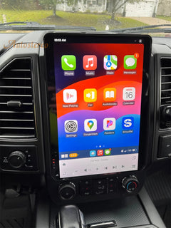 Car dashboard with a touchscreen display showing app icons
