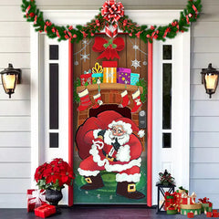 Decorative Christmas door with Santa Claus, presents, and garlands on a house exterior.
