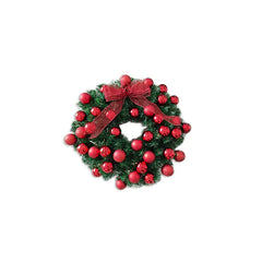 Christmas wreath with red berries and a bow on a white background