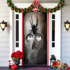 Decorative door with a Halloween-themed design featuring a skull and spider, surrounded by Christmas decorations.