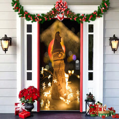 Decorative door with Christmas lights, garlands, and a statue of a woman holding a lamp.