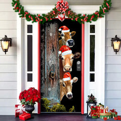 Decorative door with Christmas-themed cow design, garlands, and lights on a house exterior.