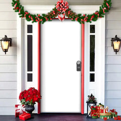 Decorative Christmas door with garland, poinsettias, and gift boxes on a white door.
