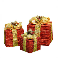 Decorative red and gold gift boxes with bows on a white background