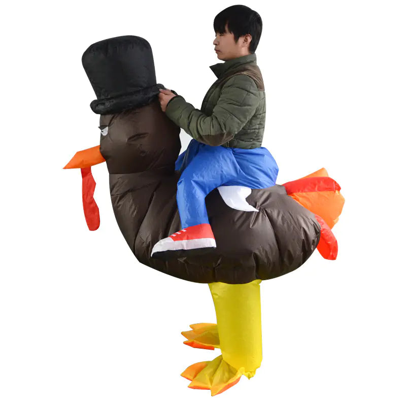 Person wearing an inflatable turkey costume on a white background